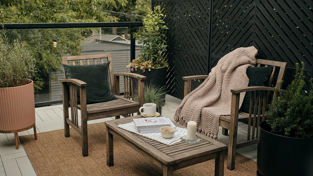 Outdoor patio with privacy screens and planters